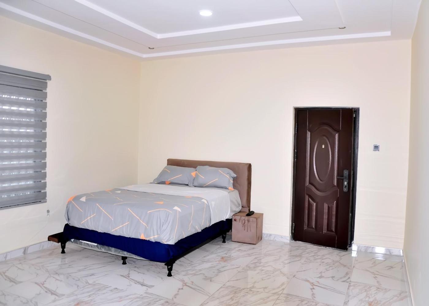 Hotel Queens Place à Accra Extérieur photo